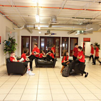 Students hanging out in the main lounge area of M.A.S. Charter School