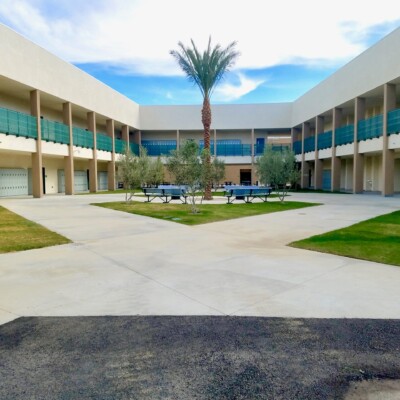The court yard of a modern two story charter school facility