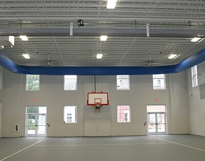 School Gymnasium with basketball hoops