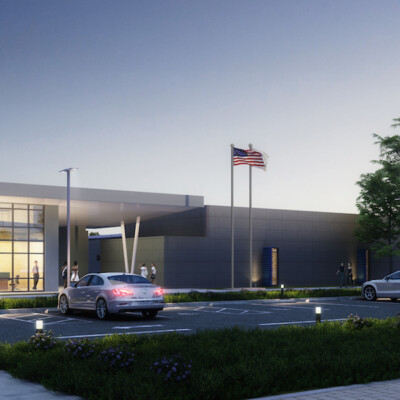 Cars parked out front of the main office for Norton Science and Language Academy